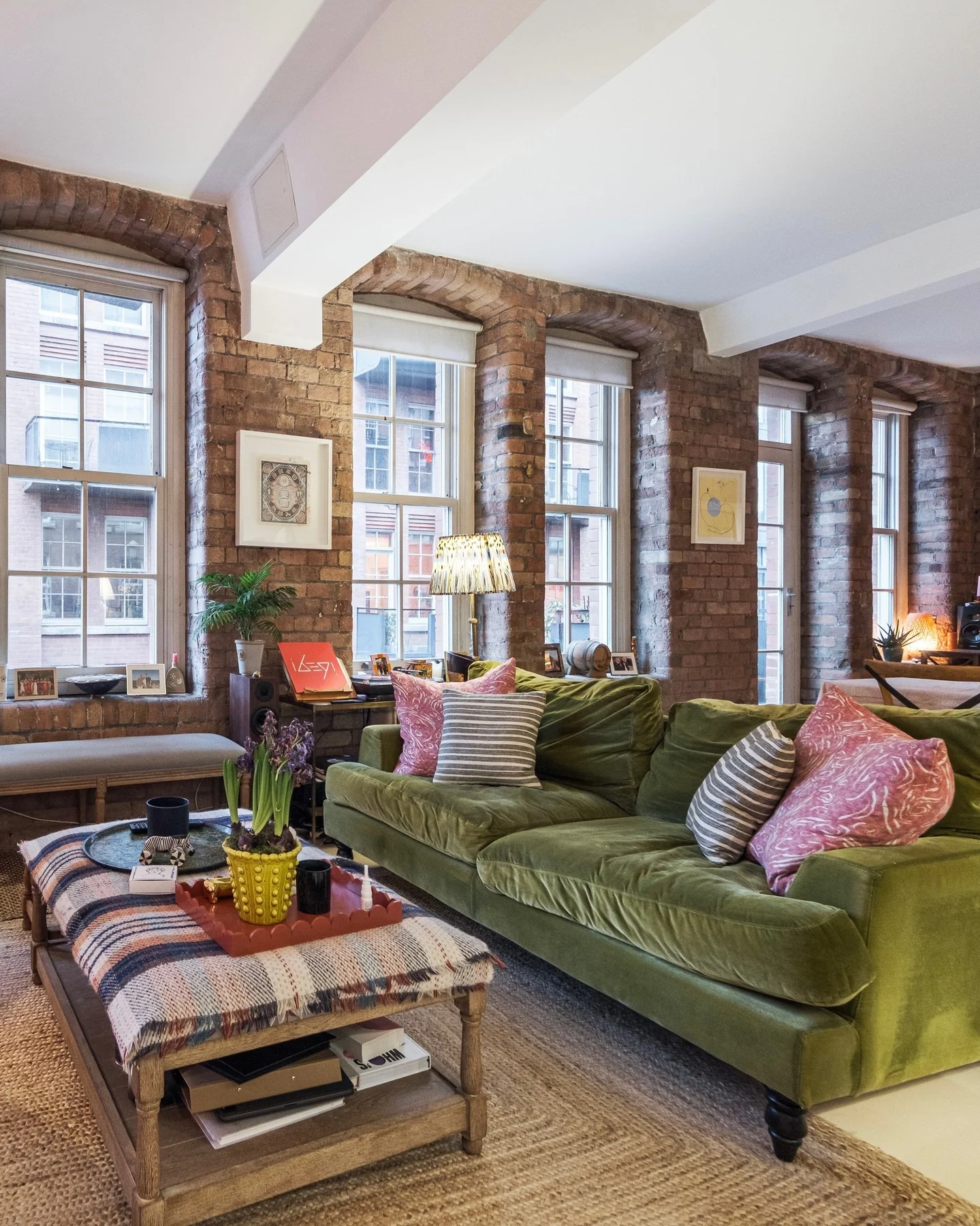 Urban Loft with Exposed Brick and Green Velvet Comfort (Urban Living Room Ideas)