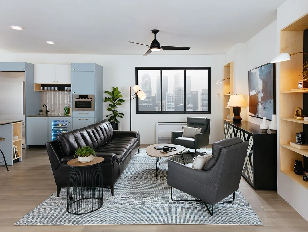 Urban Apartment with Sleek Black Leather and Cool Blue Accents (Urban Living Room Ideas)