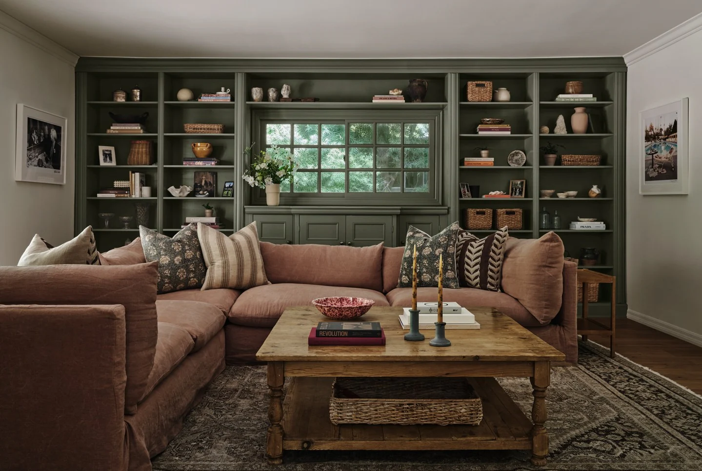 4. Dusty Rose Sectional with Forest Cabinetry (Masculine Living Room Ideas)