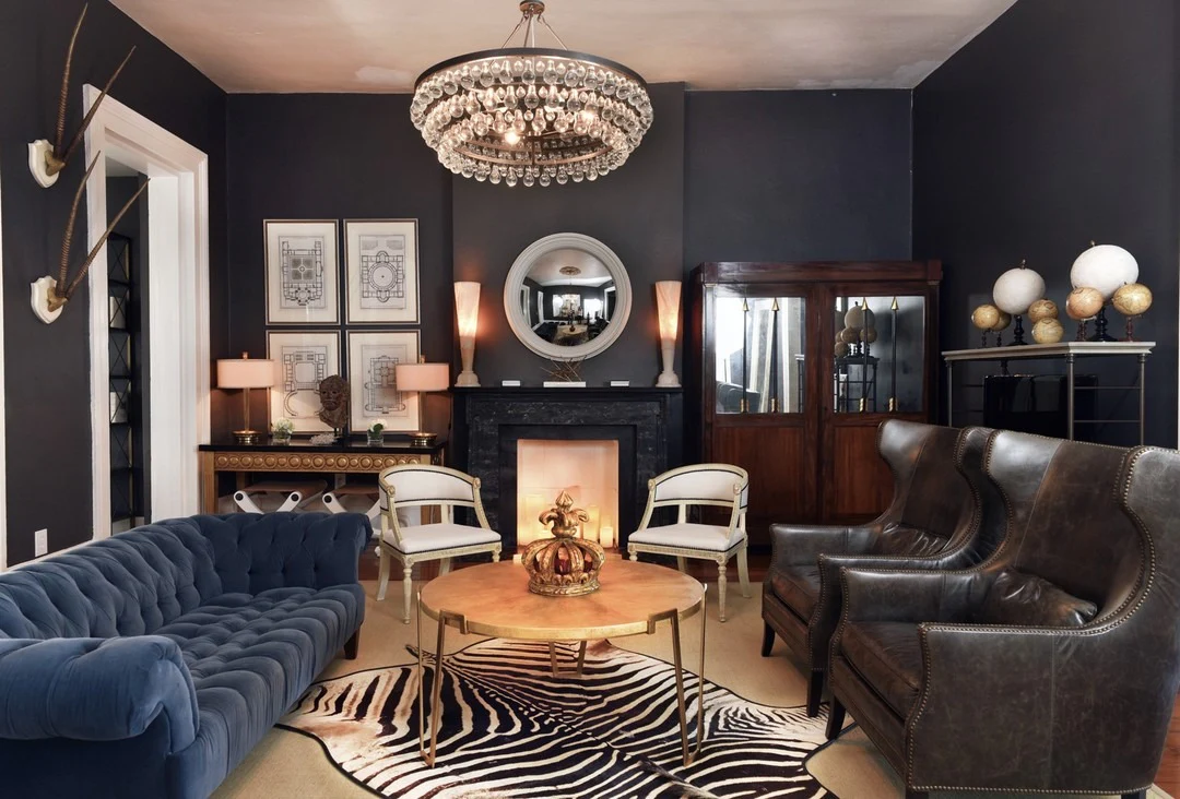 5. Charcoal Walls with Sapphire Tufted Seating (Masculine Living Room Ideas)