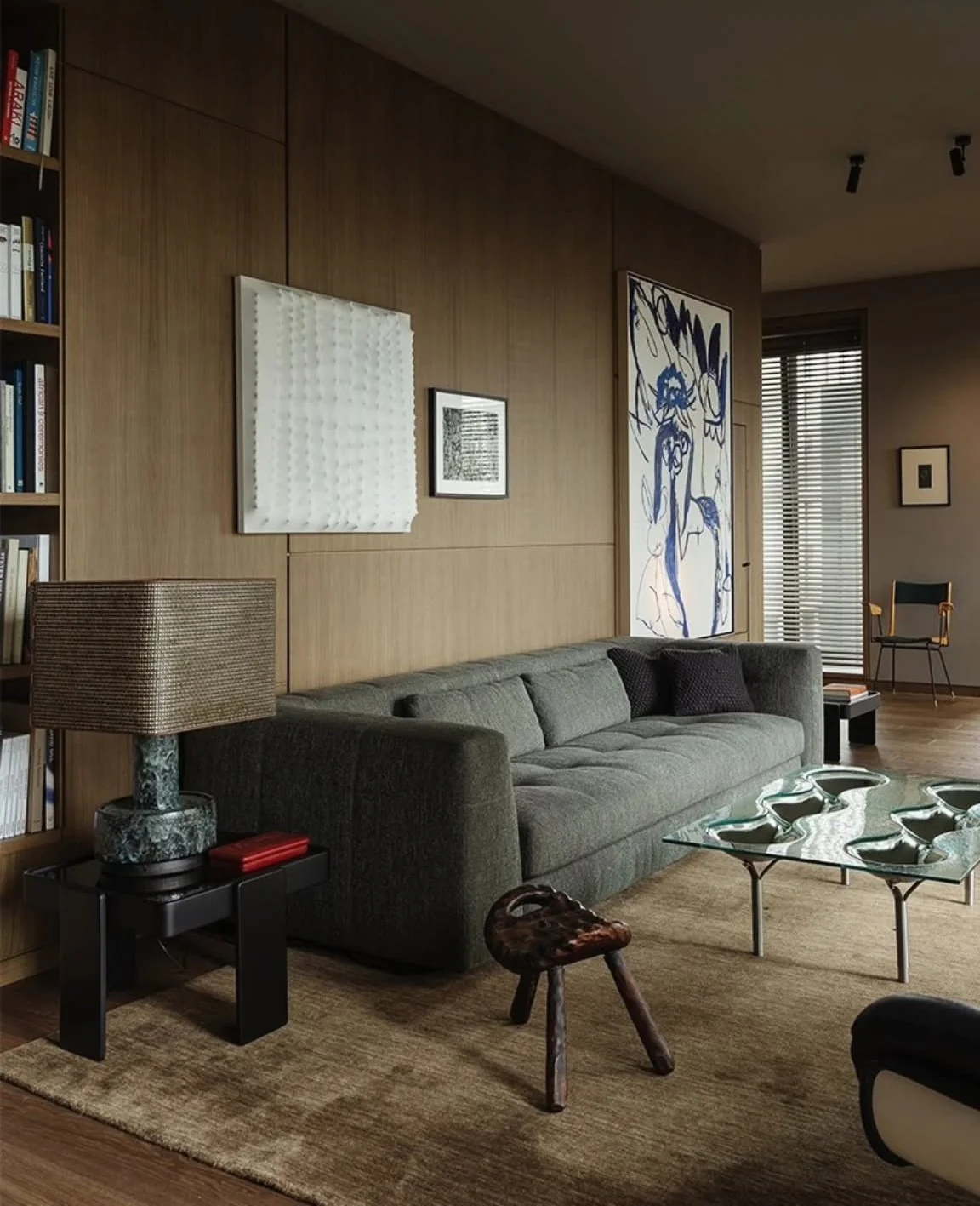 14. Smoked Oak Walls with Charcoal Upholstery (Masculine Living Room Ideas)