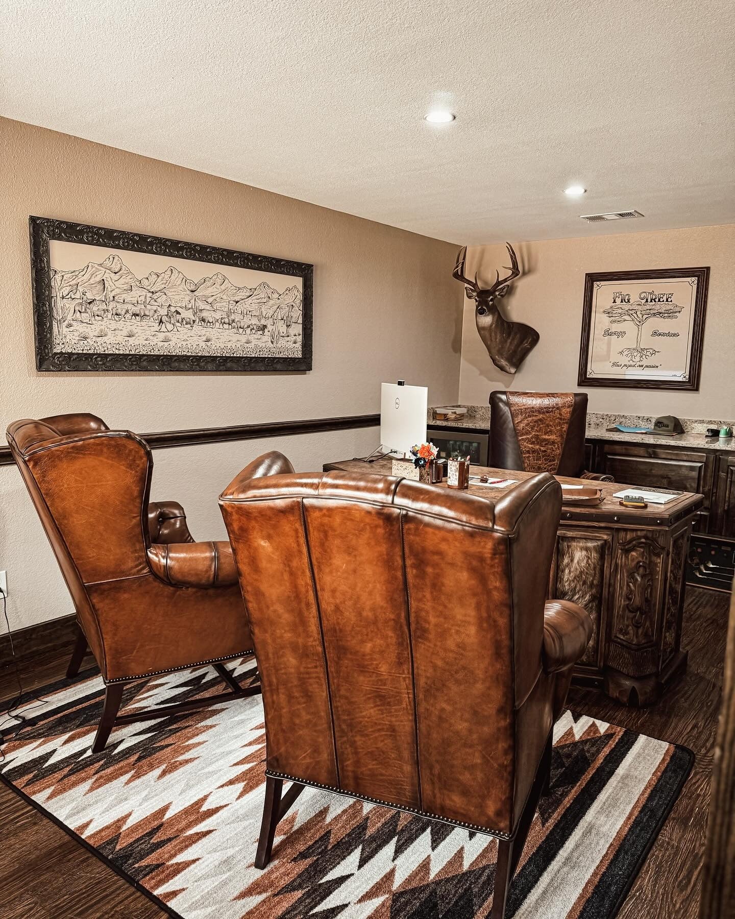 Executive Elegance with Saddle-Brown Leather and Southwestern Rugs (Rustic Office Ideas)