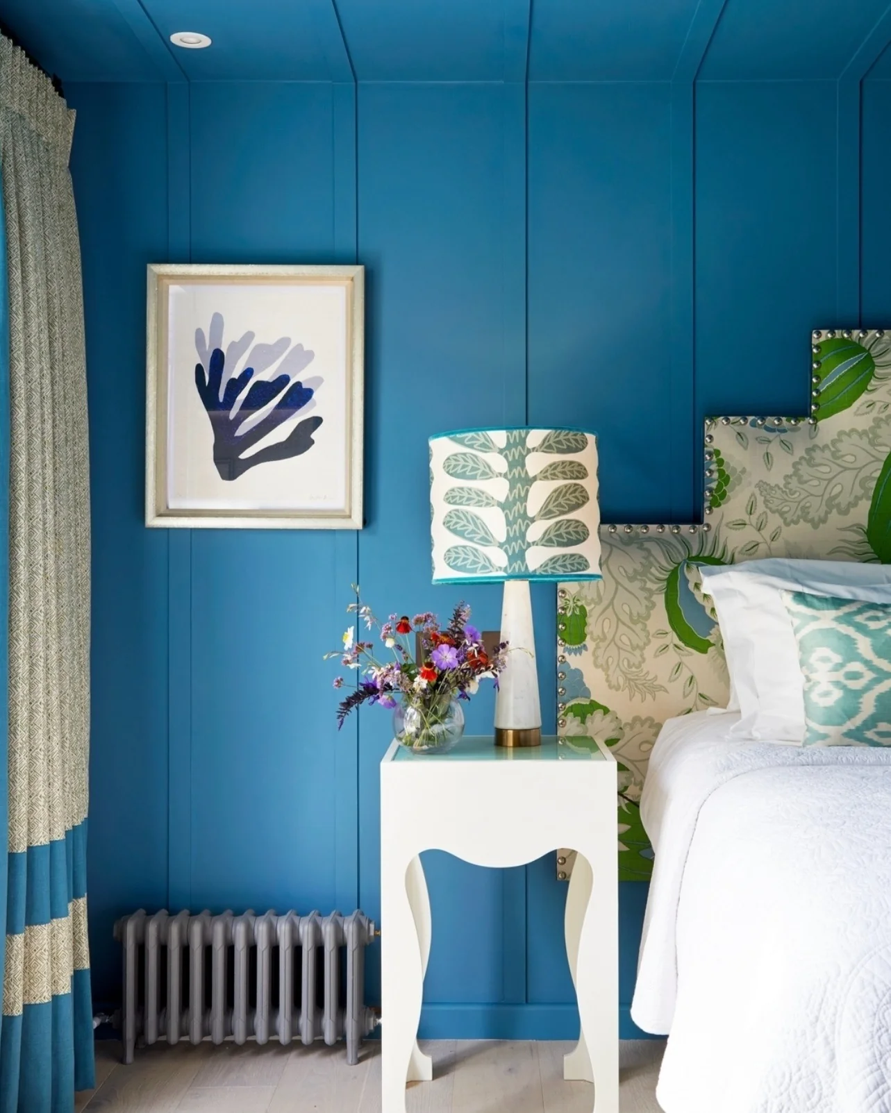 Bold Blue Paneling with Green Accents