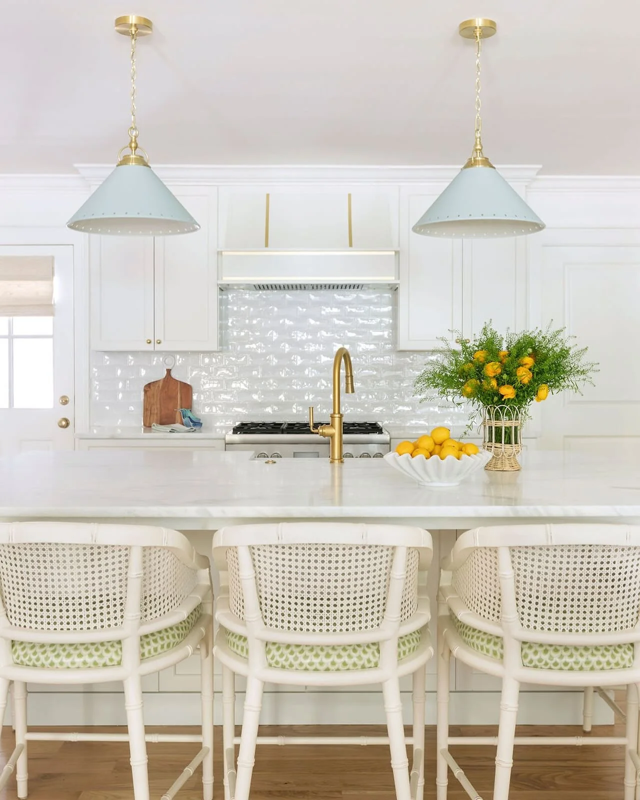 Vibrant Citrus Hues with White Cane Seating (Kitchen Centerpiece Ideas)