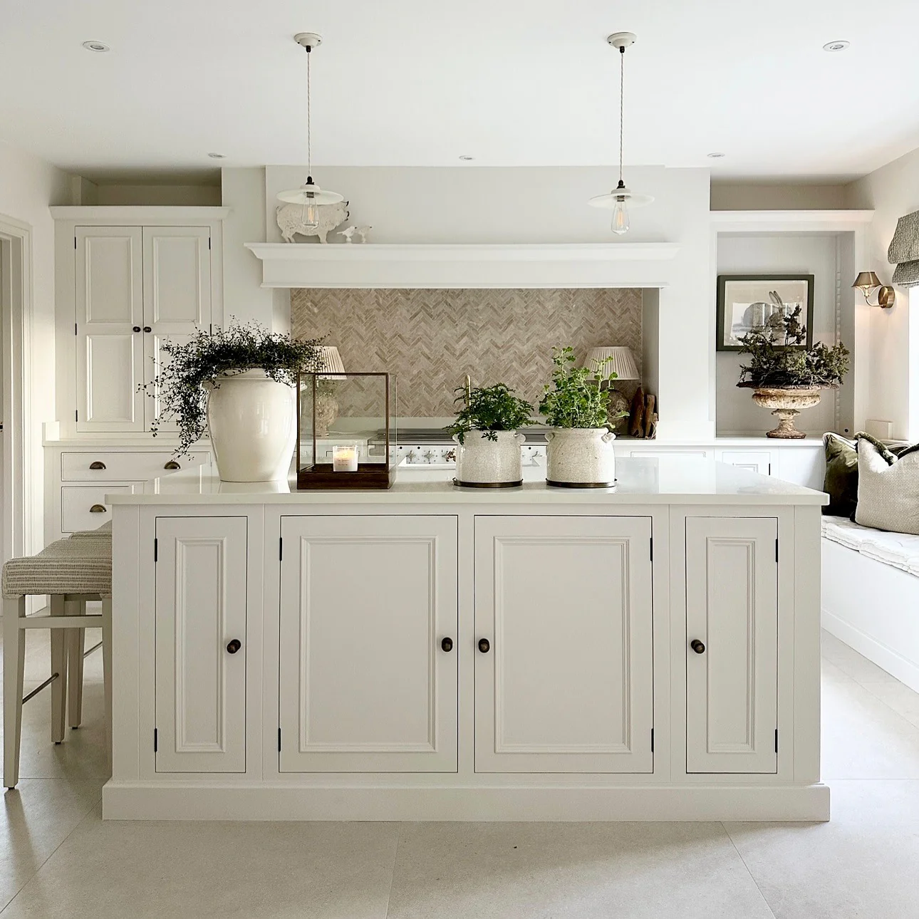 Understated Greenery in a Sophisticated White Kitchen (Kitchen Centerpiece Ideas)