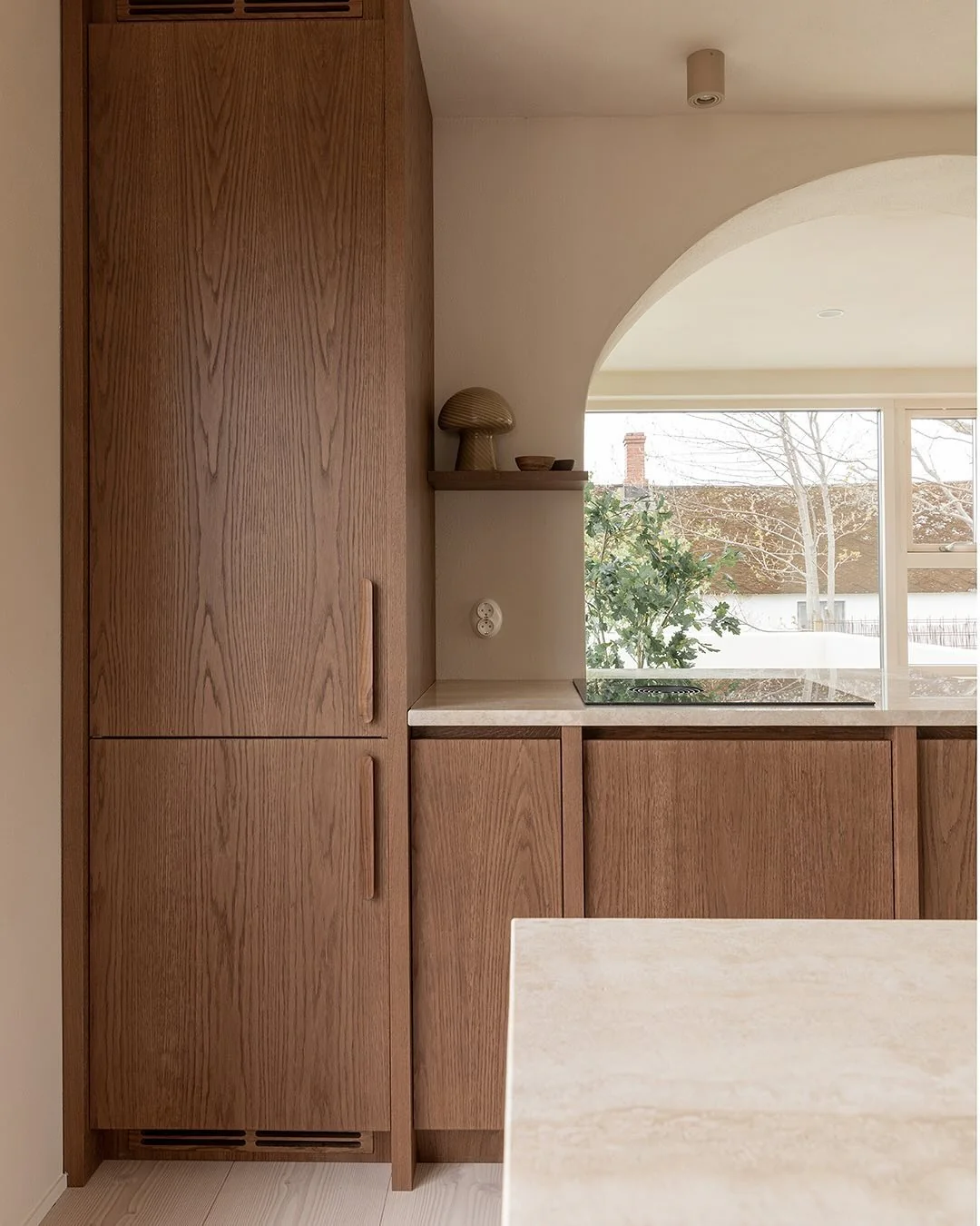 Sleek Oak Cabinets Paired with Stone Countertops (Wooden Kitchen Ideas)