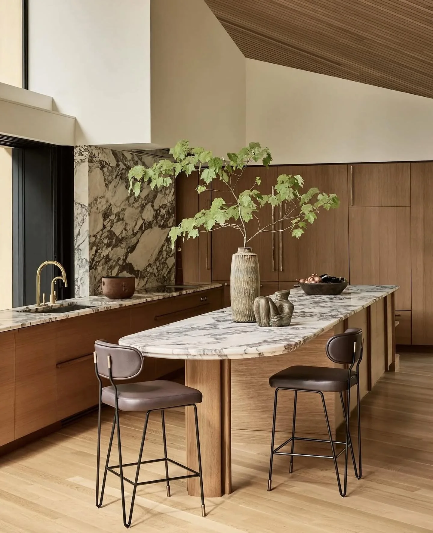 Contemporary Comfort with a Marble Centerpiece (Wooden Kitchen Ideas)