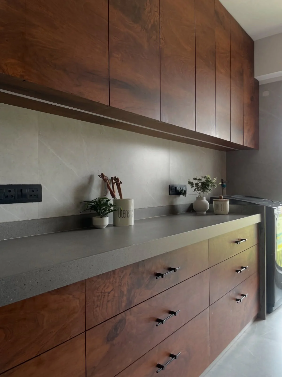 Bold Walnut Cabinets with Matte Stone Surfaces (Wooden Kitchen Ideas)