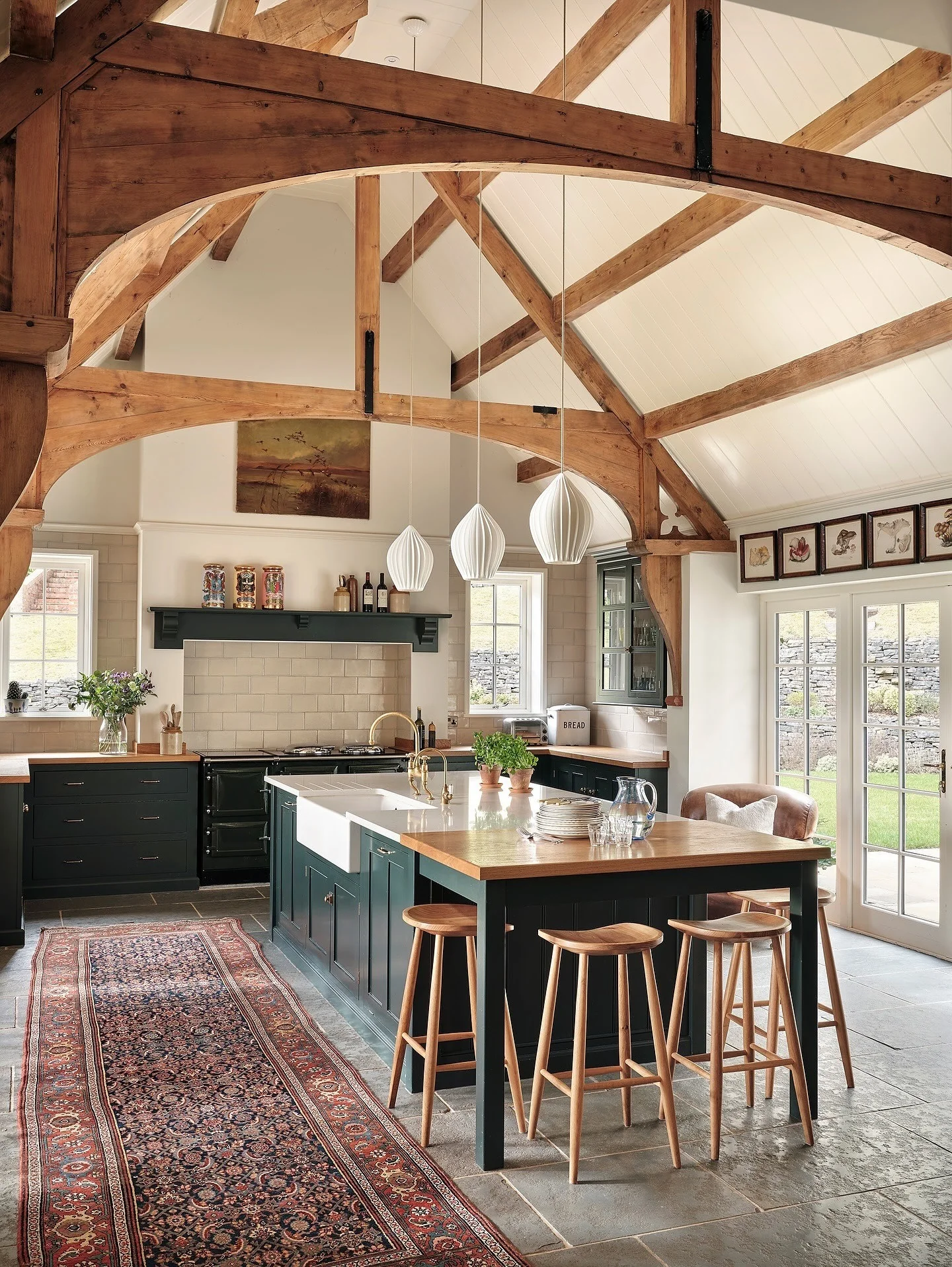 Rustic Appeal with Vaulted Ceilings and Dark Cabinetry (Barndo Kitchen Ideas)