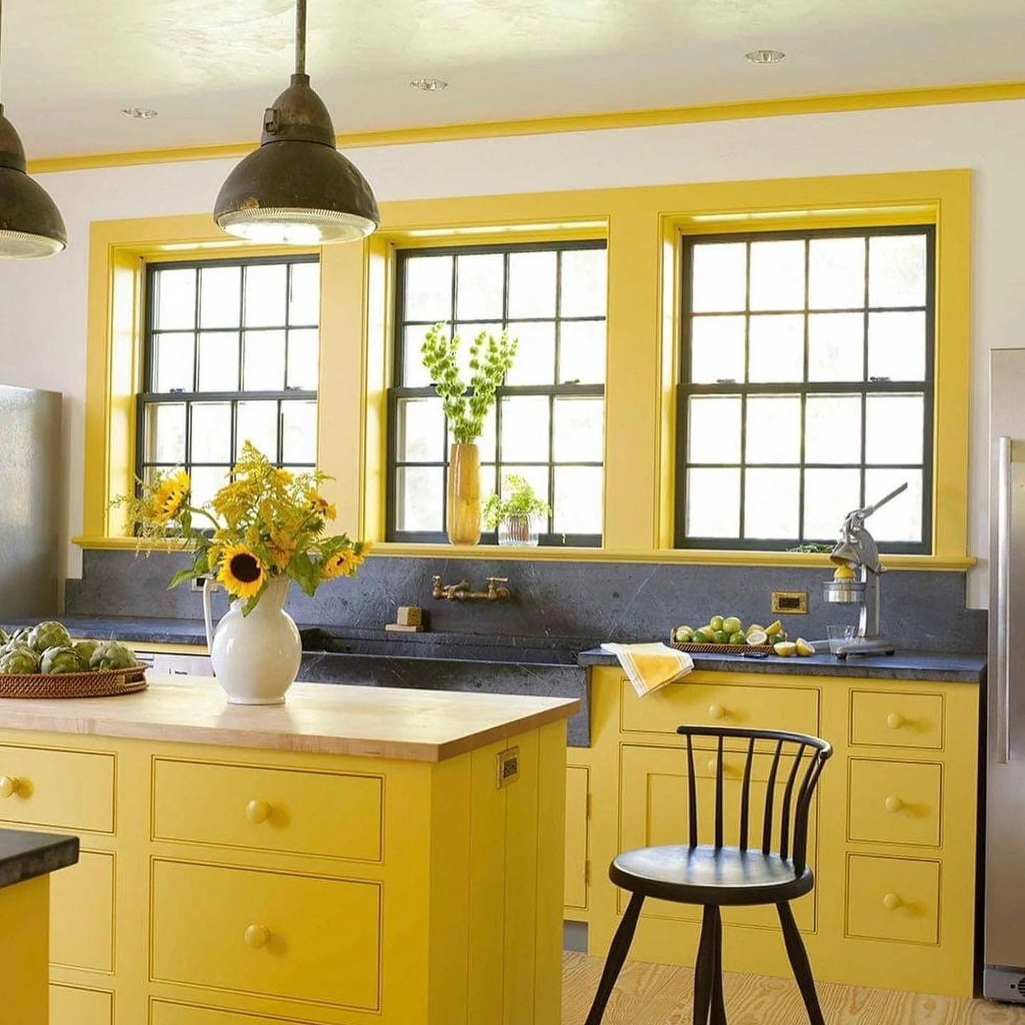Vibrant Citrus Contrast: Yellow Cabinets with Dark Countertops (Yellow Kitchen Ideas)