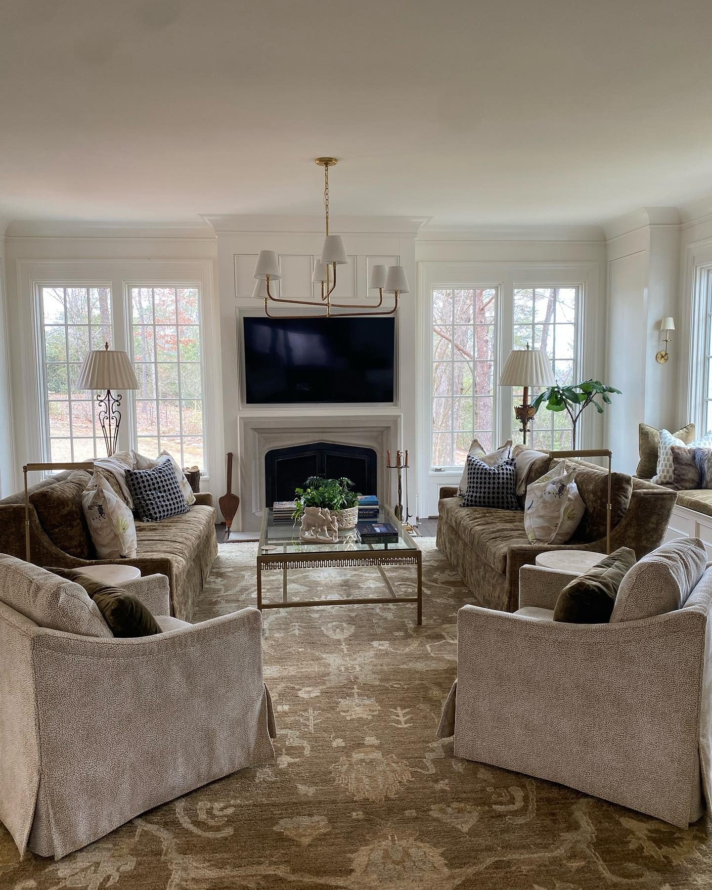 Symmetrical Living Room with Brass Chandelier