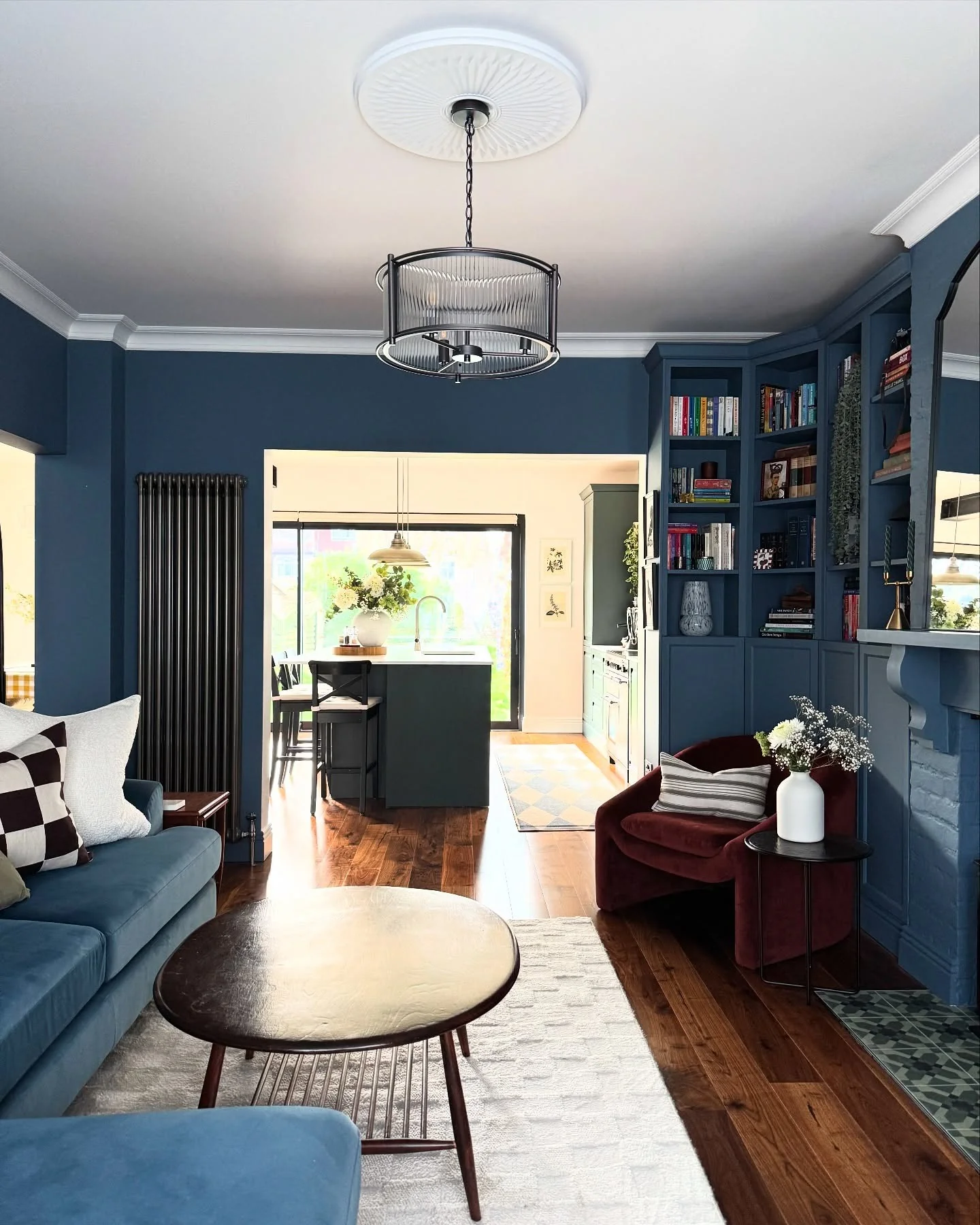 Rich Contrast with Jewel-Toned Highlights (Open Kitchen Living Room Ideas)