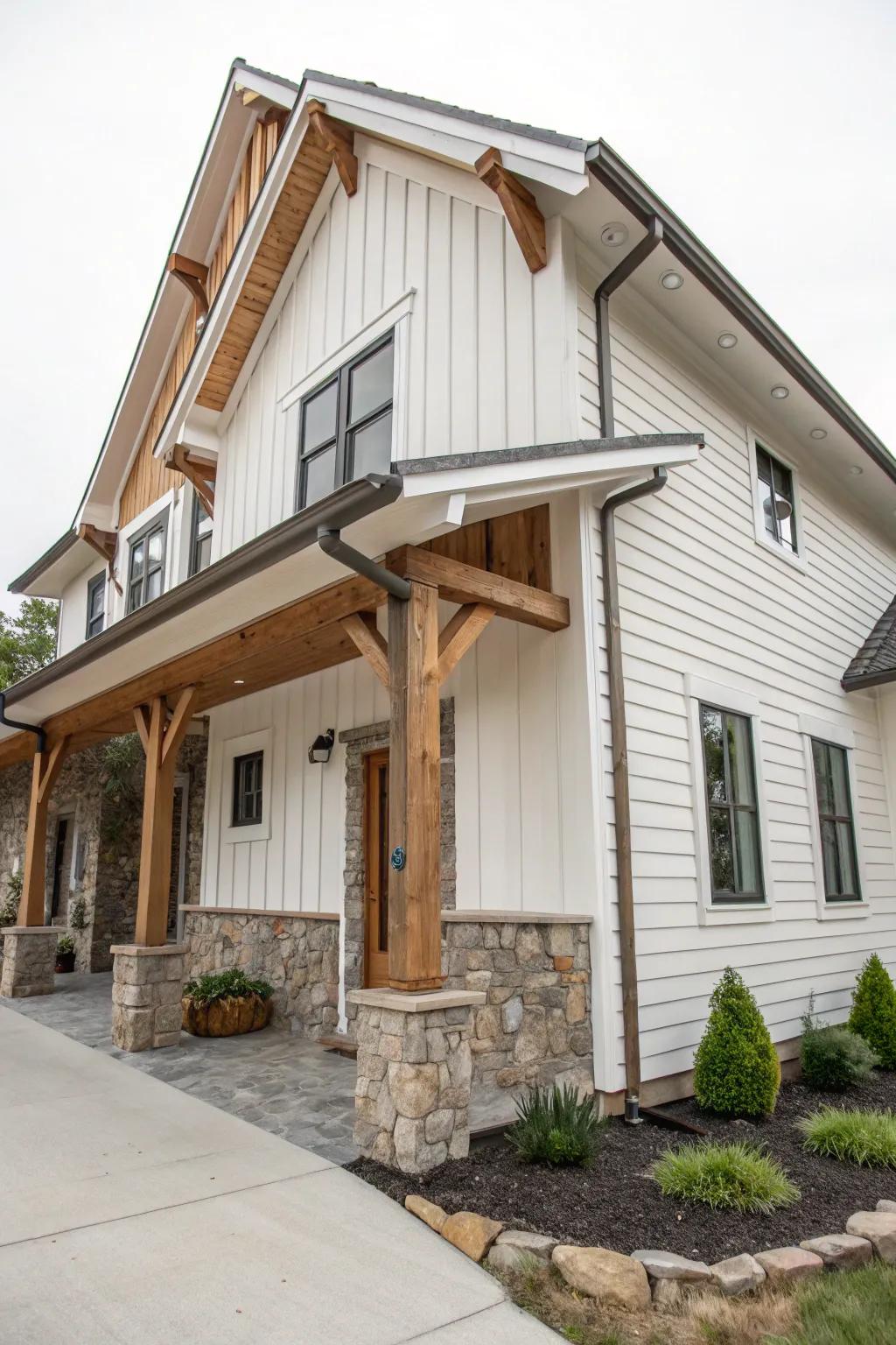 A harmonious blend of wood and stone elements with white siding.