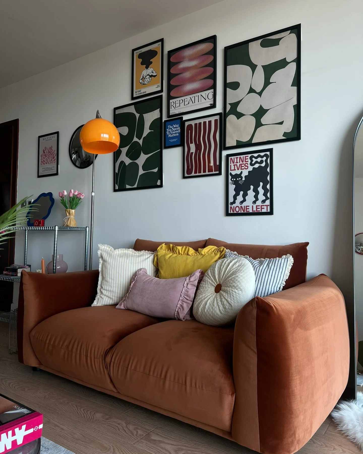 Retro Orange Accents with Mid-Century Energy (Gallery Wall Living Room Ideas)