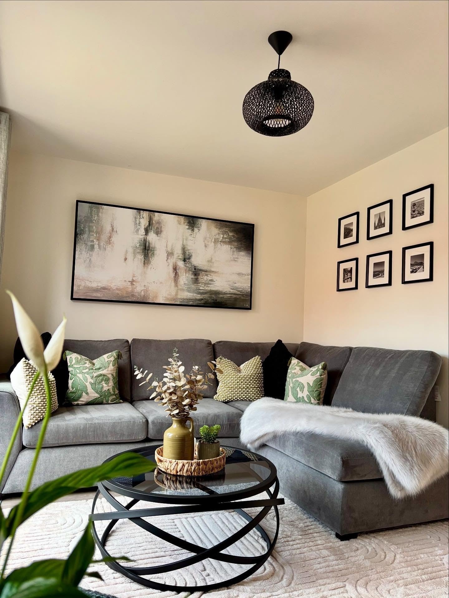 Contemporary Contrast with Natural Elements (Gallery Wall Living Room Ideas)