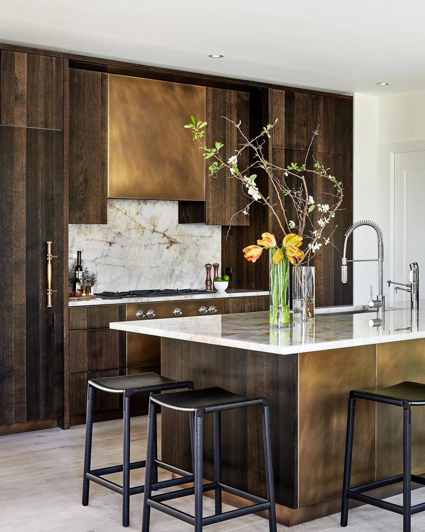 Kitchen with espresso cabinets and bronze panels