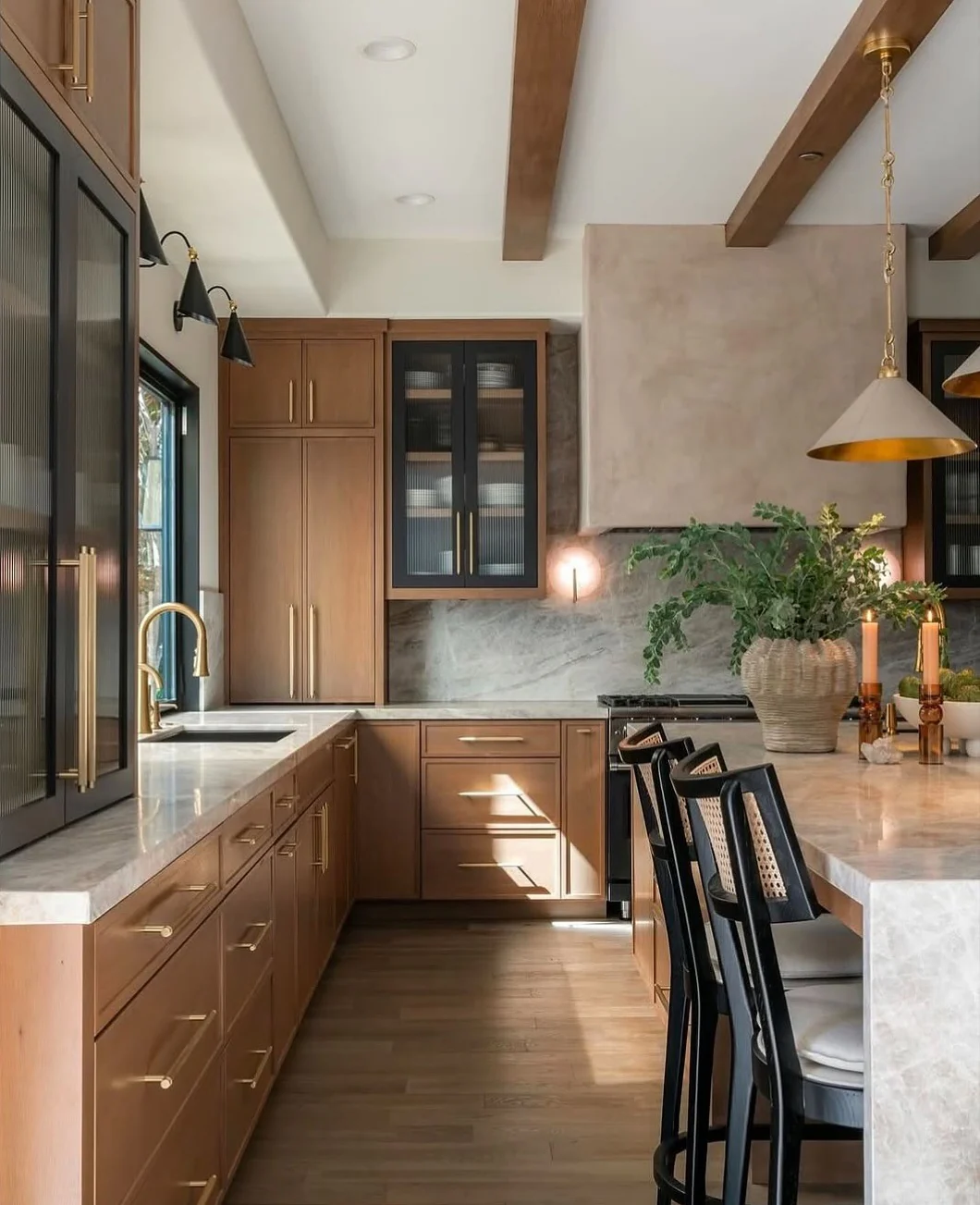Modern craftsman kitchen with chestnut cabinets and brass hardware