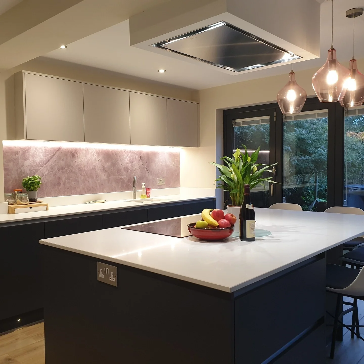 Soft Modern Kitchen with Mauve Backsplash