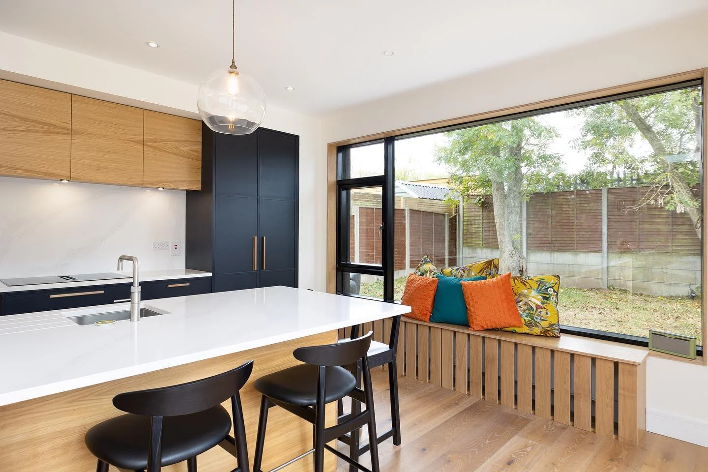 Two-Tone Kitchen with Oak and Black Cabinets