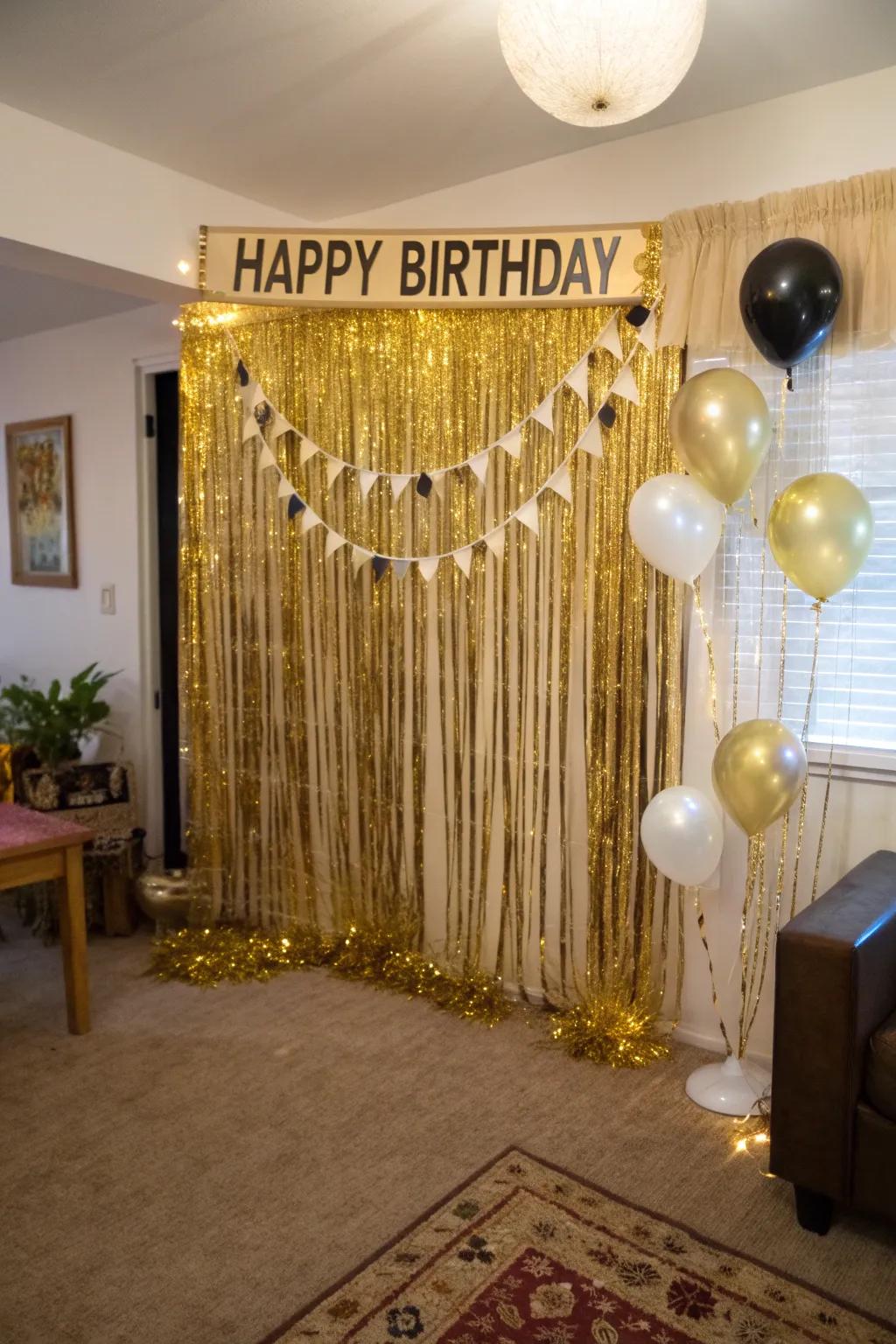 A gold tinsel backdrop is excellent for capturing birthday moments.