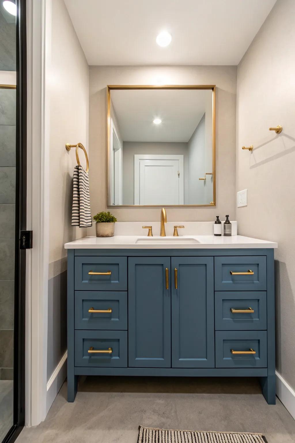 Steel blue and gold fixtures foster a sophisticated, modern atmosphere.