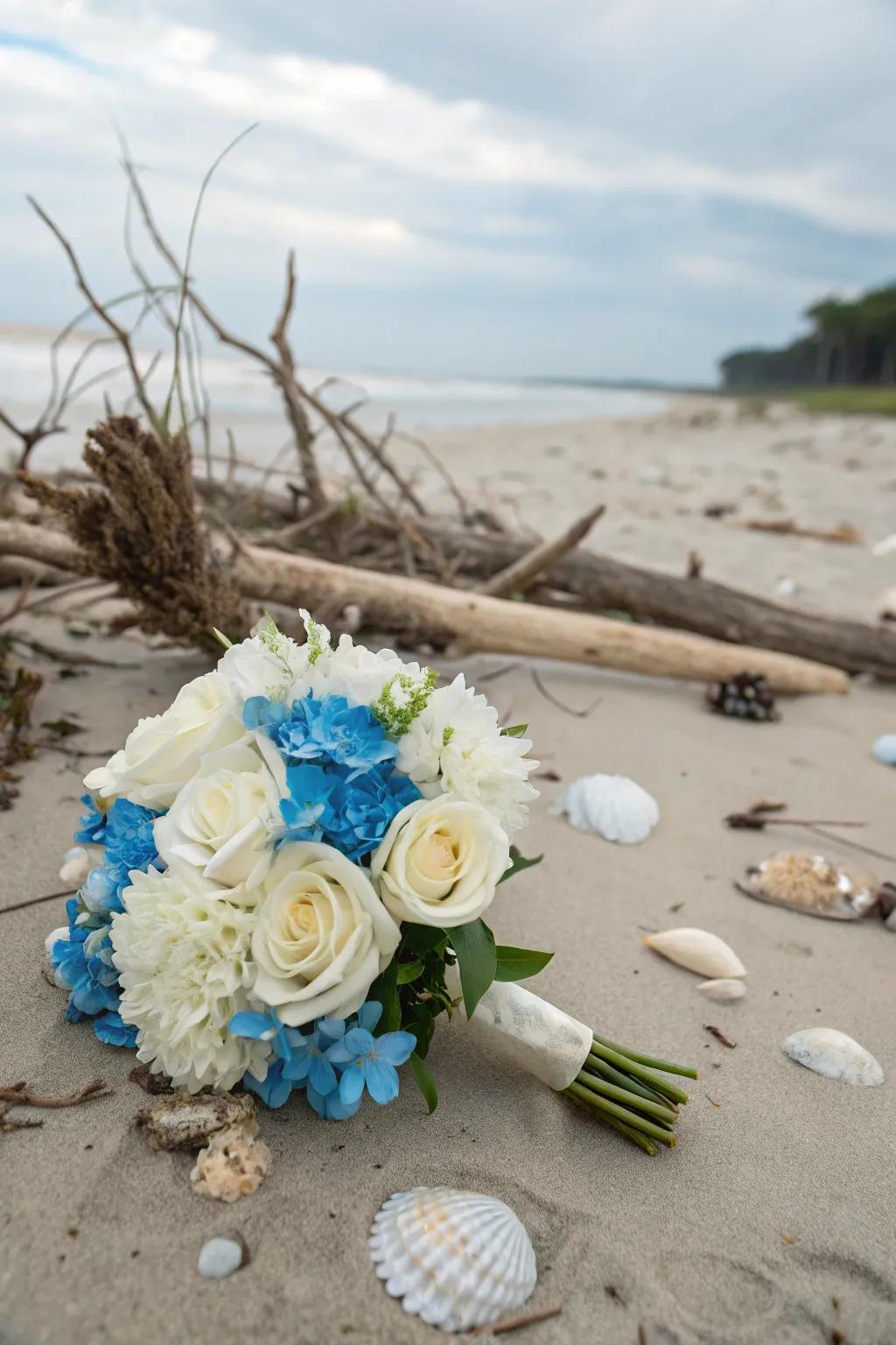 Coastal-themed flower arrangement with blue and white flowers.