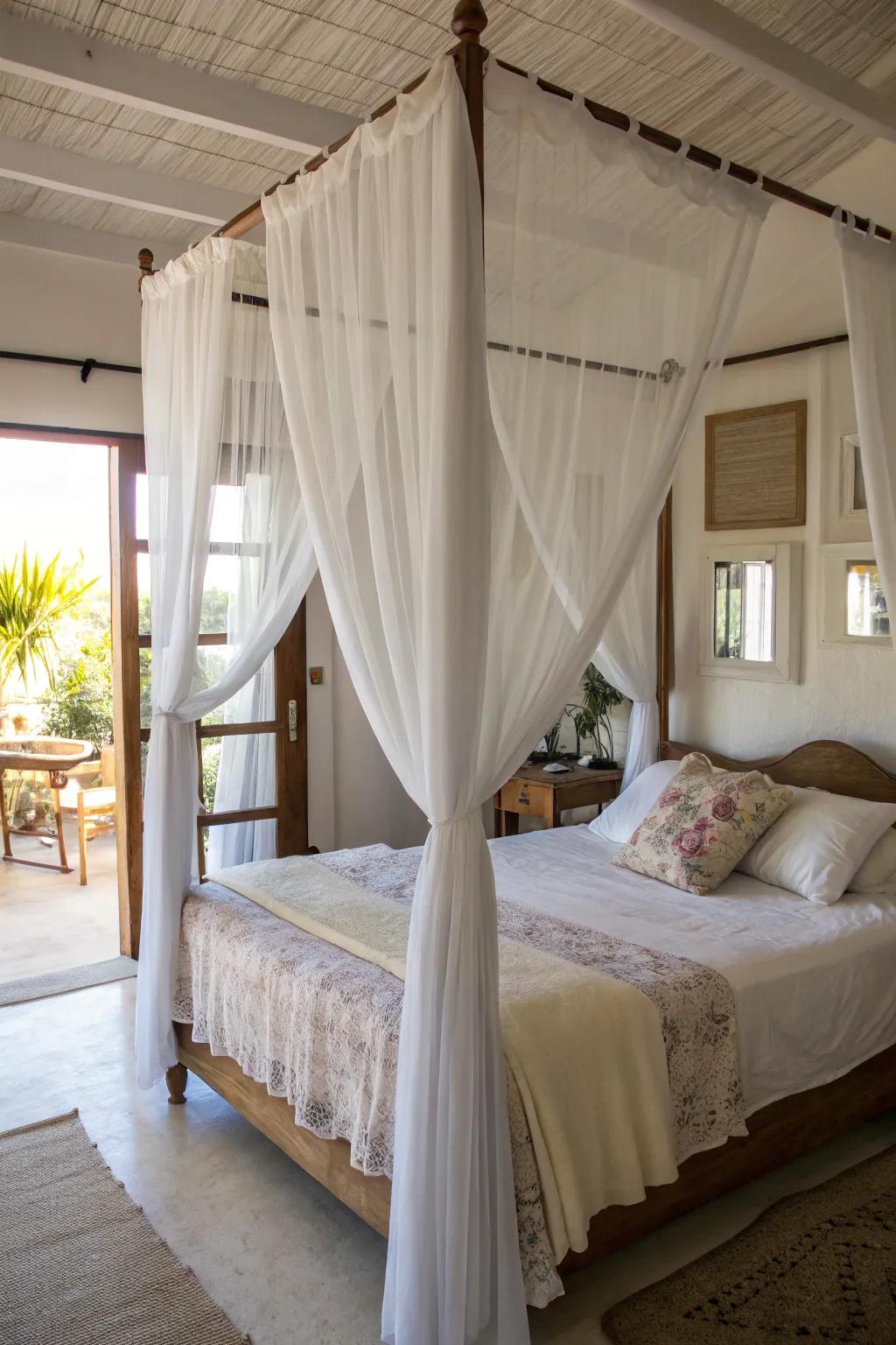 See-through curtains on a canopy bed maintain an airy and bright atmosphere.