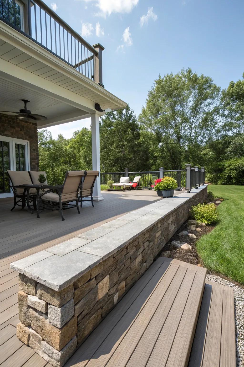 A deck that remains immaculate with resilient, low-maintenance stone skirting.
