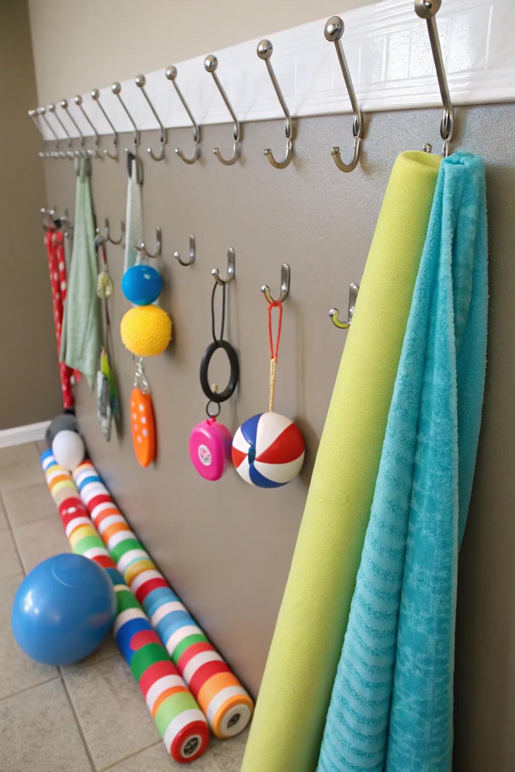 Command hooks offer flexible and not lasting pool float storage.