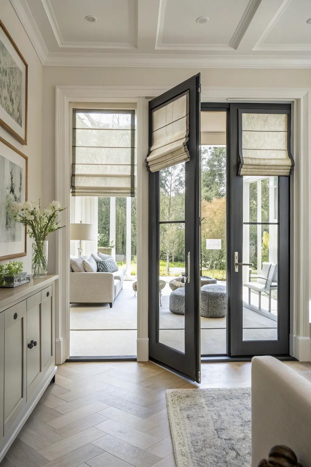 Roman shades provide a polished and functional look for French doors.