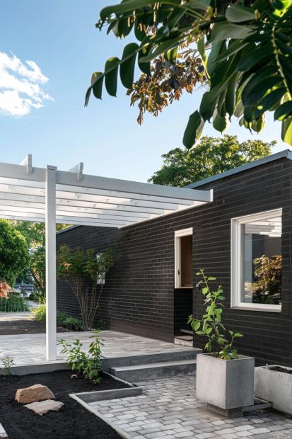 Modern black brick bungalow with white windows