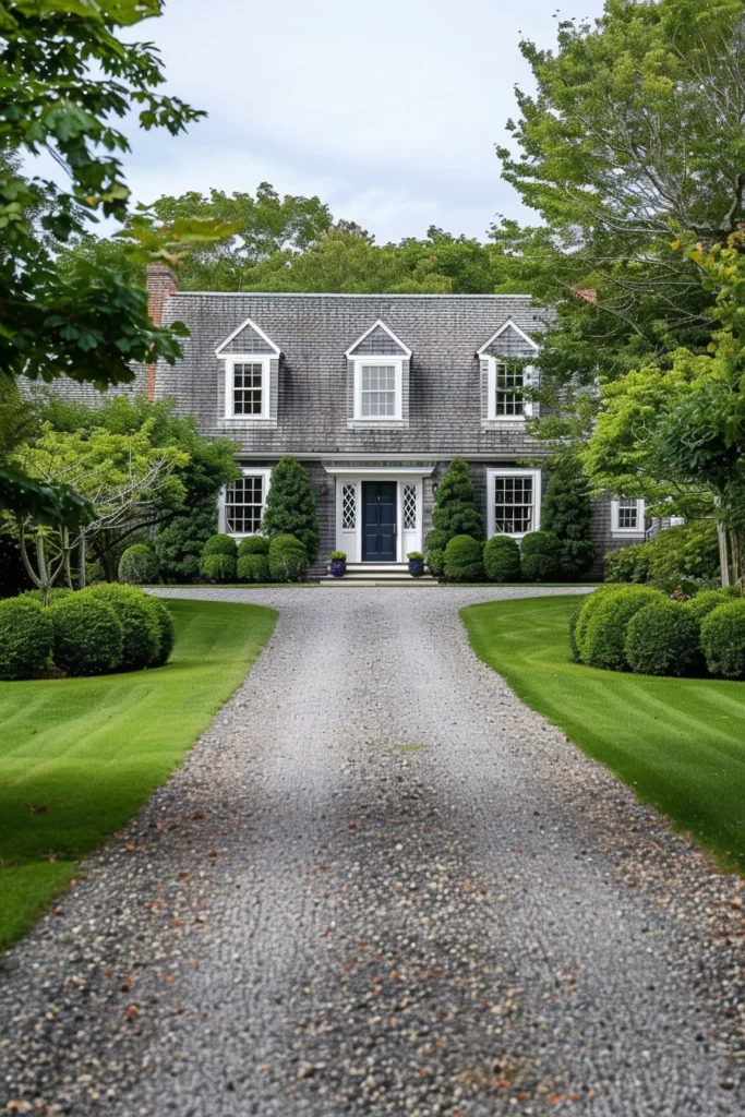 Cape Cod home with gravel driveway